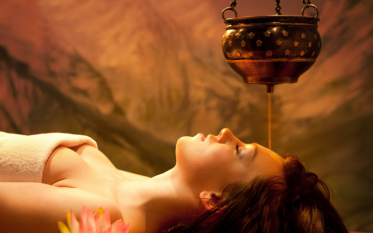 Ayurvedic massage in Amritsar showing Shirodhara therapy with warm medicated oil flow treatment for stress relief, relaxation, and nervous system balance.